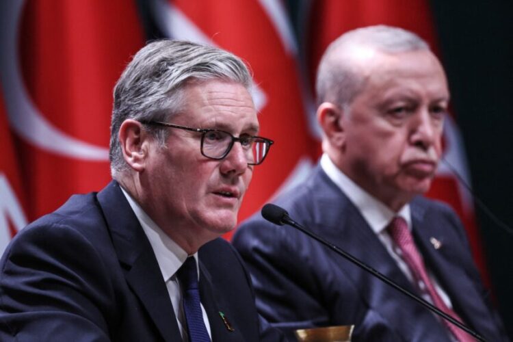 Britain's Prime Minister Keir Starmer (L) and Turkey's President Recep Tayyip Erdogan (R) hold a joint press conference after signing an $11 billion agreement for 20 Eurofighter jets at the Presidential Palace in Ankara on October 27, 2025. Starmer said London had reached an agreement to sell Eurofighter jets to Ankara in a 10-year deal worth nearly $11 billion. Britain's defence ministry said the order would involve 20 Eurofighters in what it described as the "biggest fighter jet deal in a generation". (Photo by Adem ALTAN / AFP)