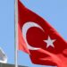 FILE PHOTO: A Turkish flag flutters atop the Turkish embassy as an Israeli flag is seen nearby, in Tel Aviv, Israel June 26, 2016.  REUTERS/Baz Ratner/File Photo