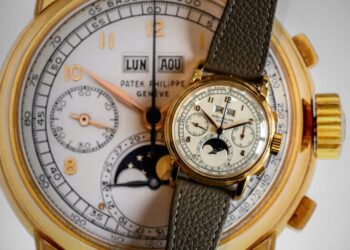 A Patek Philippe 'First Series' pink gold perpetual calendar chronograph wristwatch with moon phases and case by Wenger, made in 1950, is photographed during a press preview at Sotheby's auction house in Geneva, on November 7, 2024. The wristwatch is expected to fetch between $2.8 and $5,7 millions when it will go on sale at Sotheby's 'Tresures of Time' auction, in Geneva on November 10, 2024. (Photo by Fabrice COFFRINI / AFP)