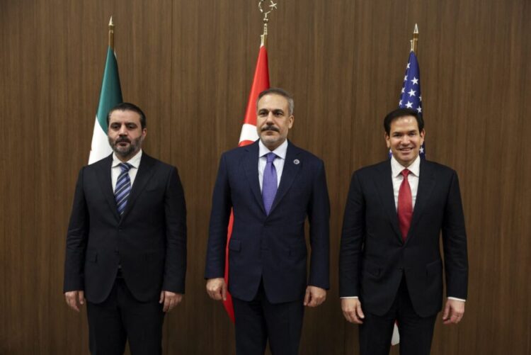 From left: Syrian Foreign Minister Asaad Hassan al-Shibani, Turkish Foreign Minister Hakan Fidan and US Secretary of State Marco Rubio, pose for a photograph during a meeting at the NEST International Convention Center, in Antalya on May 15, 2025. (Photo by Umit Bektas / POOL / AFP)