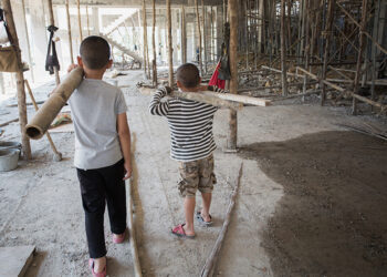 Image blur, Poor children working at construction site against children labour,  World Day Against Child Labour  and trafficking concept.; Shutterstock ID 1188822772; Purchase Order: -