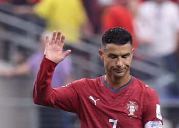 Portugal's forward #07 Cristiano Ronaldo waves to fans after losing the 2026 World Cup round of 16 football match between Portugal and Spain at the Dallas Stadium in Arlington on July 6, 2026. (Photo by Thomas COEX / AFP)