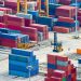 Aerial view of commercial port with colorful freight containers and equipment, Singapore